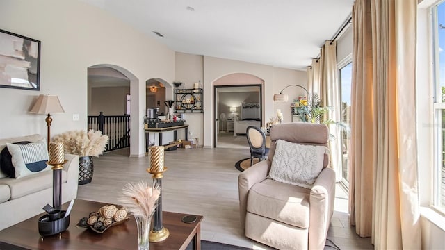 living room with light hardwood / wood-style flooring