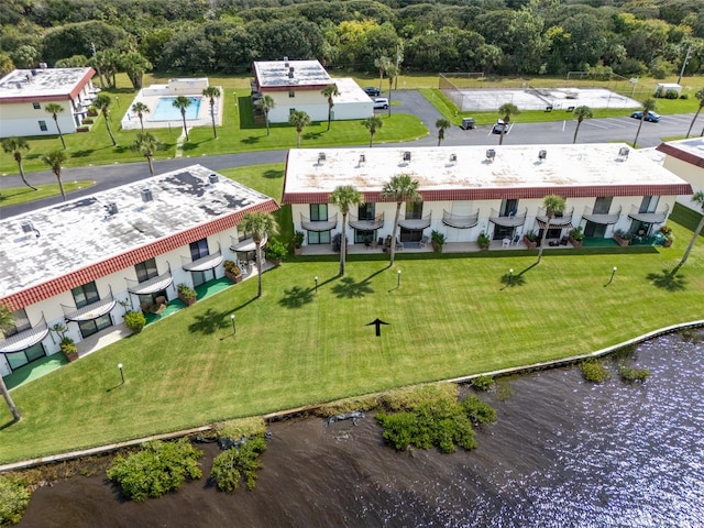 bird's eye view with a water view