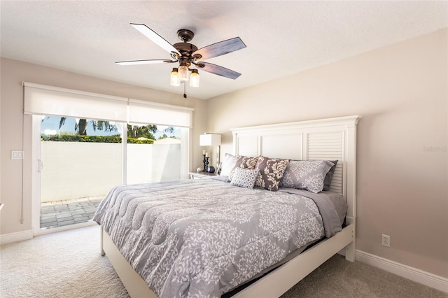 bedroom featuring a textured ceiling, light carpet, ceiling fan, and access to exterior