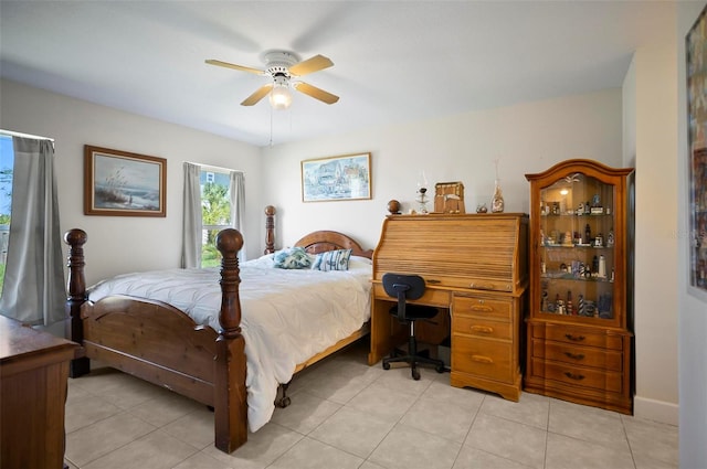 bedroom featuring ceiling fan and light tile patterned floors