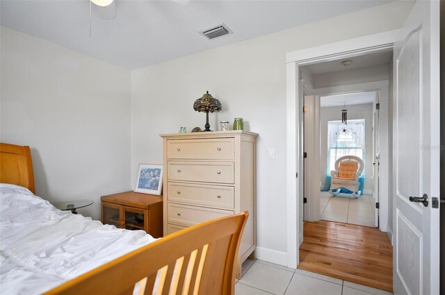 bedroom featuring light wood-type flooring and ceiling fan