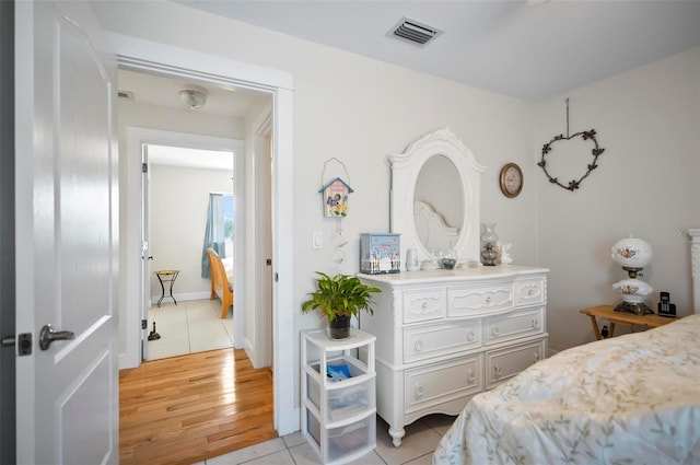 bedroom featuring light wood-type flooring