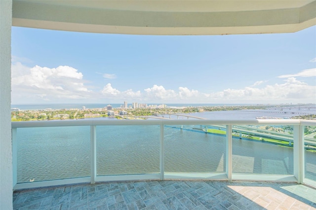 balcony featuring a water view