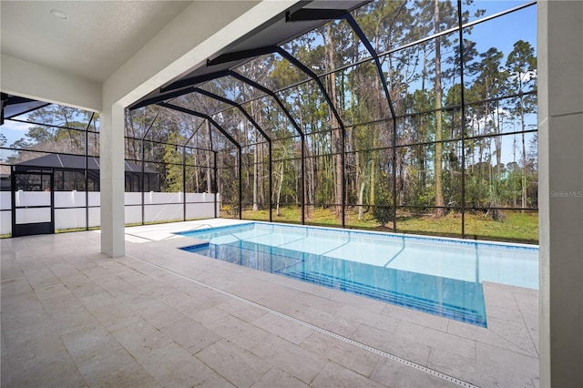 pool with a patio and a lanai