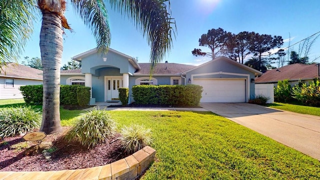 single story home with a garage and a front yard