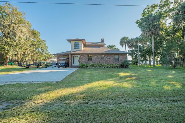 view of front of home with a front lawn