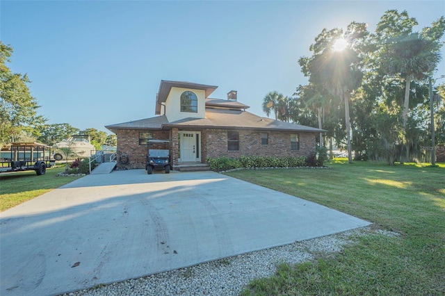 view of front facade with a front yard