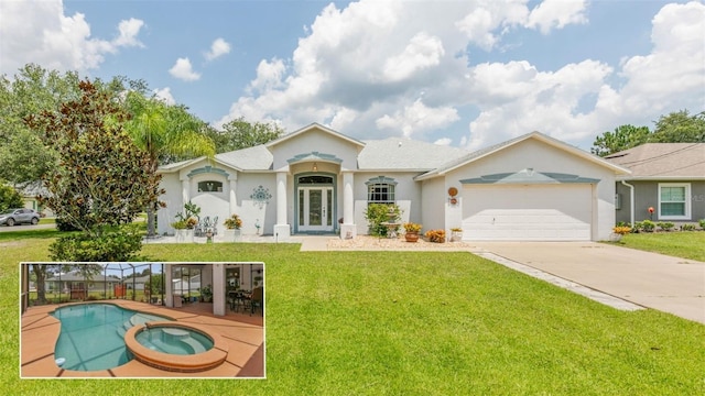 exterior space with a front yard and a garage