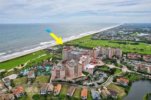 aerial view with a beach view and a water view