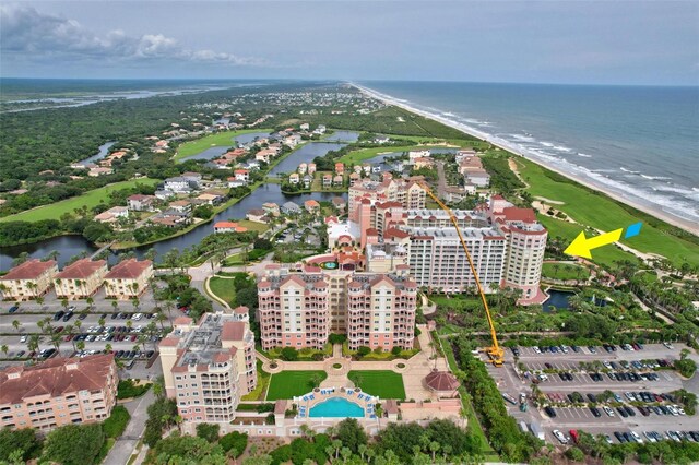 aerial view with a view of the beach and a water view