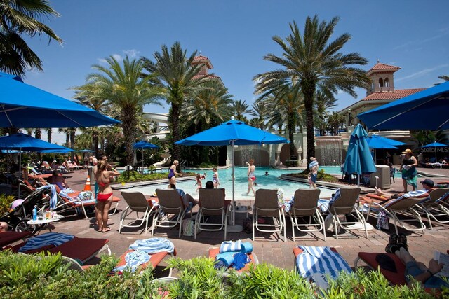 view of swimming pool featuring a patio area