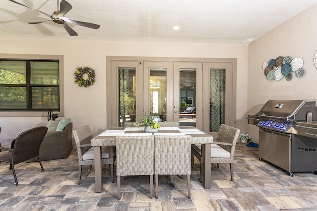 view of patio with french doors, ceiling fan, and a grill