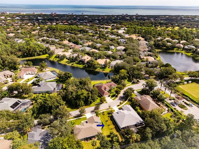 drone / aerial view with a water view