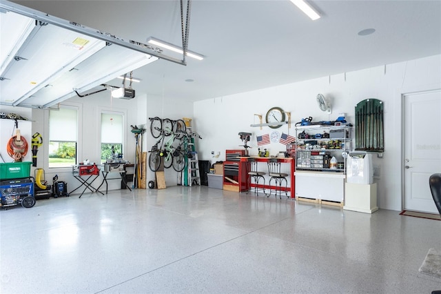 garage featuring a garage door opener