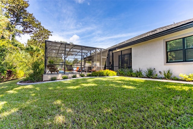 view of yard with a lanai