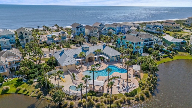 birds eye view of property featuring a water view