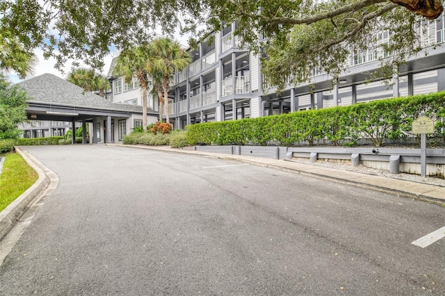 110 Ocean Hollow Ln Unit 101, Saint Augustine, FL 32084 - view of asphalt road with curbs