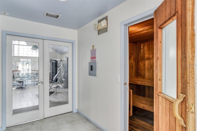 110 Ocean Hollow Ln Unit 101, Saint Augustine, FL 32084 - hallway featuring french doors and baseboards