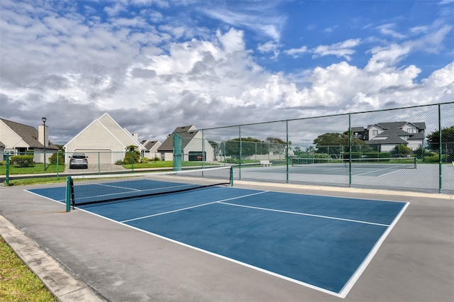 110 Ocean Hollow Ln Unit 101, Saint Augustine, FL 32084 - view of tennis court with a residential view