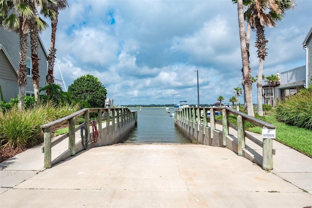 dock area featuring a water view