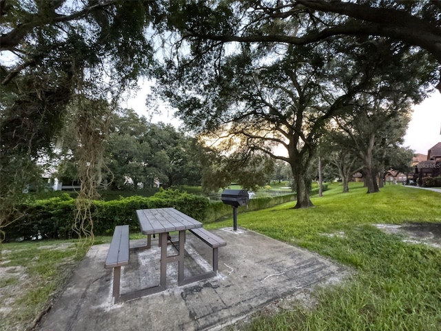 view of home's community with a lawn