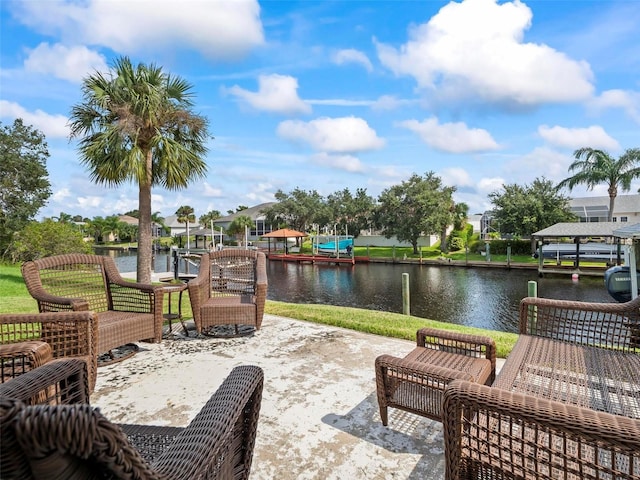 exterior space featuring a water view and a dock