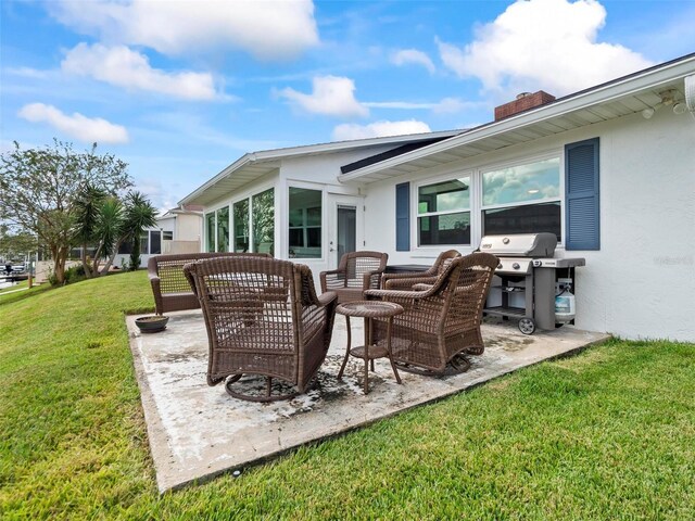 view of patio with a grill