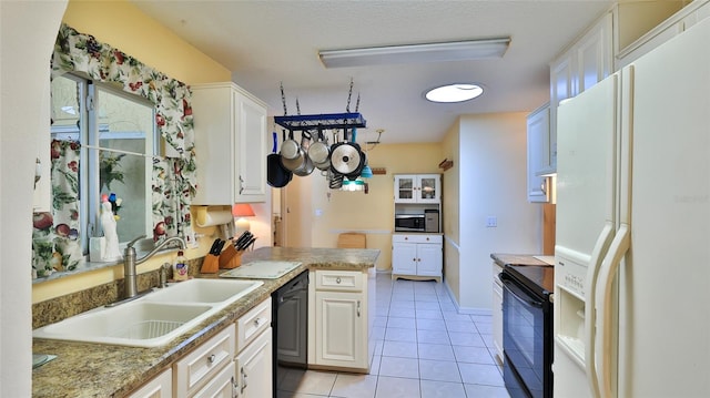 kitchen featuring white cabinets, black appliances, kitchen peninsula, and sink