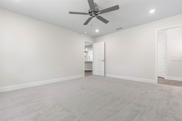 unfurnished bedroom with ceiling fan and carpet