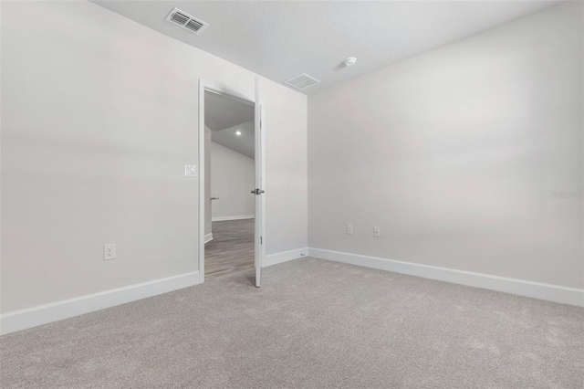 empty room with carpet floors