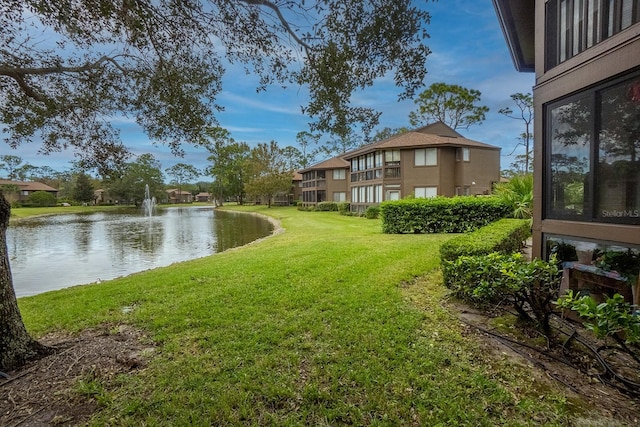 view of yard with a water view