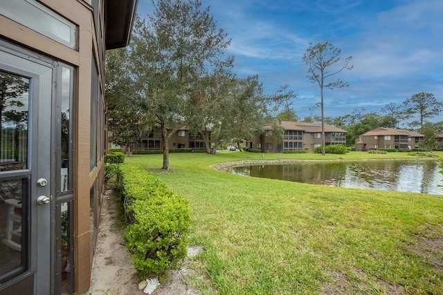 view of yard featuring a water view