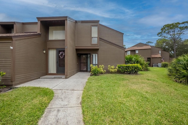 exterior space with a front yard