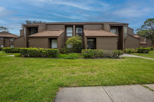 view of front of home featuring a front lawn