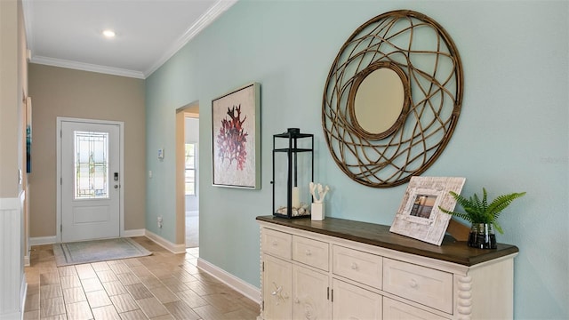 foyer entrance featuring light wood-type flooring and crown molding