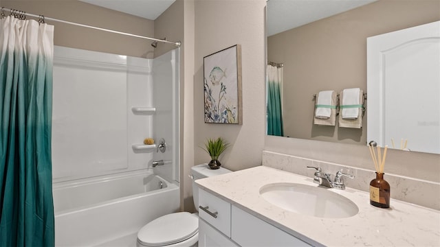 full bathroom featuring shower / bath combo, vanity, and toilet