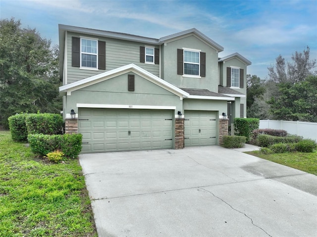 view of front of property featuring a garage