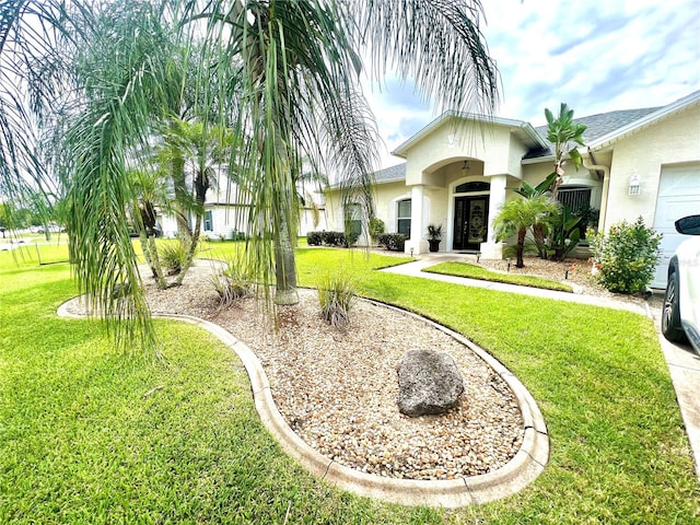 view of yard featuring a garage