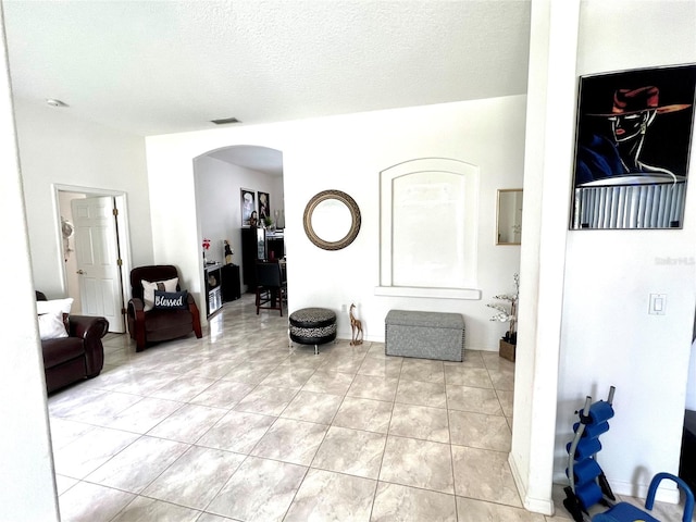 interior space with a textured ceiling