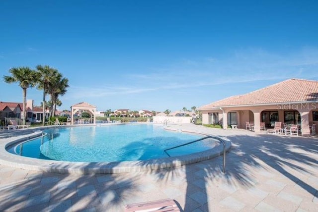 view of pool with a patio