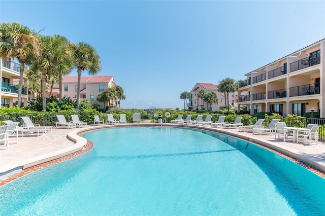 view of pool featuring a patio