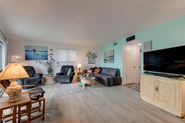 living room with light wood-type flooring