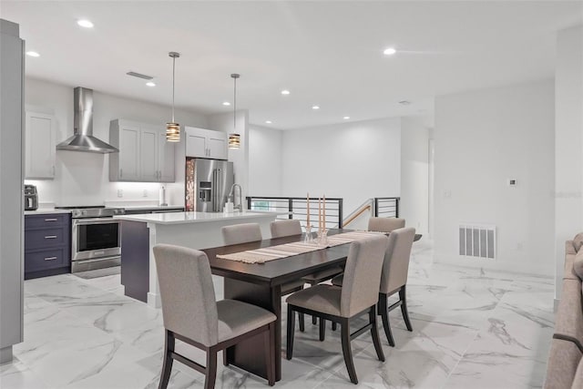 dining room featuring sink