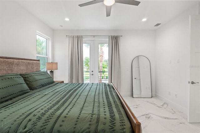 bedroom with multiple windows, ceiling fan, and access to exterior