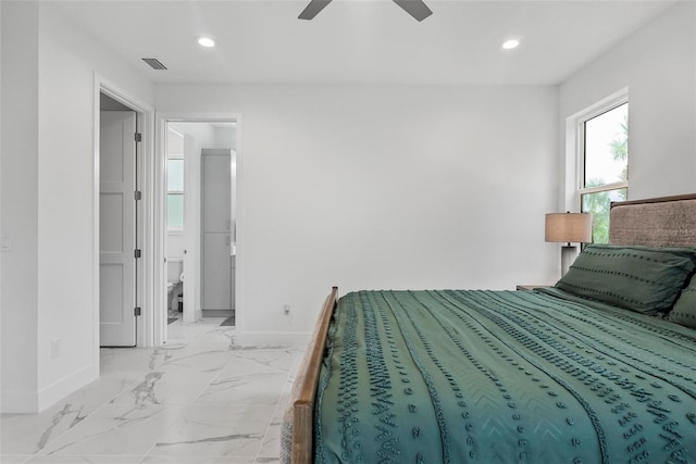 bedroom featuring ceiling fan and connected bathroom