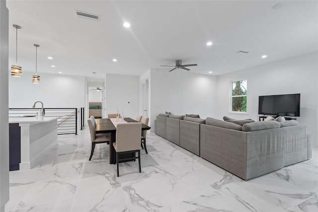 living room featuring ceiling fan