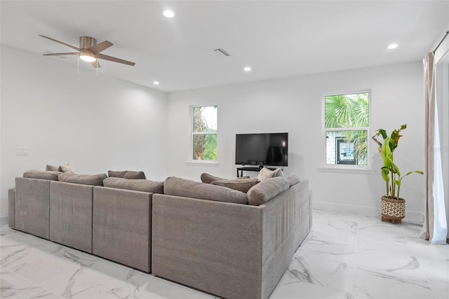 living room featuring ceiling fan