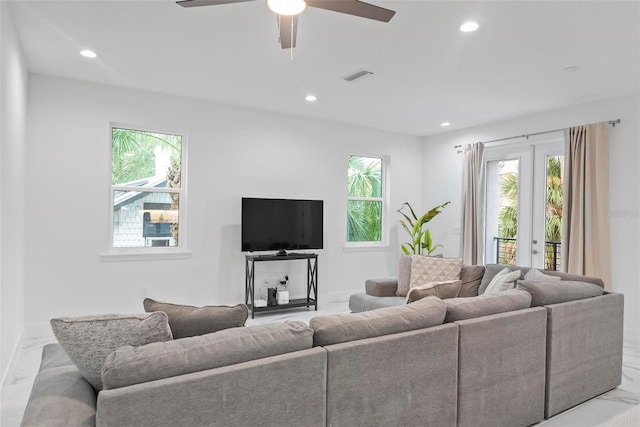 living room featuring ceiling fan