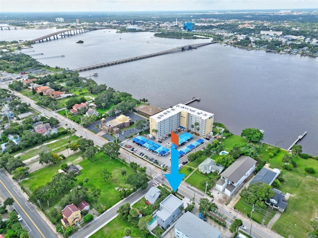 birds eye view of property featuring a water view