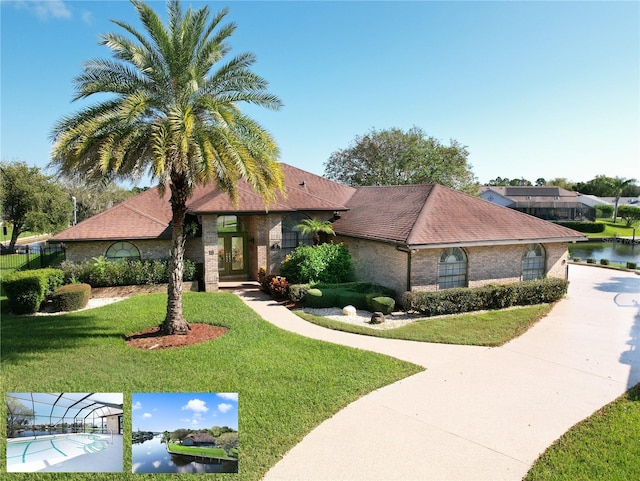 view of front of property featuring a water view and a front yard